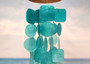 Turquoise Capiz Shell Wind Chime (1 Chime approx. 20 x 5.5 inches) Turquoise Capiz Wind Chime for beachside home charm! Copyright 2025 SeaShellSupply.com.