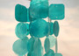 Turquoise Capiz Shell Wind Chime (1 Chime approx. 20 x 5.5 inches) Turquoise Capiz Wind Chime for beachside home charm! Copyright 2025 SeaShellSupply.com.