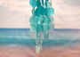 Turquoise Capiz Shell Wind Chime (1 Chime approx. 20 x 5.5 inches) Turquoise Capiz Wind Chime for beachside home charm! Copyright 2025 SeaShellSupply.com.