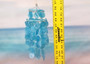 Turquoise Capiz Shell Wind Chime Chandelier (1 Chime approx. 10 x 5 inches) Turquoise Capiz Shell Wind Chime for beachside home charm! Copyright 2025 SeaShellSupply.com.\n