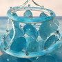 Turquoise Capiz Shell Wind Chime Chandelier (1 Chime approx. 10 x 5 inches) Turquoise Capiz Shell Wind Chime for beachside home charm! Copyright 2026 SeaShellSupply.com.