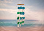 Aqua White Green Capiz Wind Chime (1 chime approx. 18 x 5.5 inches) Circle Square White Aqua Capiz Wind Chime for coastal home decoration! Copyright 2025 SeaShellSupply.com.