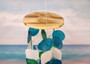 Aqua White Green Capiz Wind Chime (1 chime approx. 18 x 5.5 inches) Circle Square White Aqua Capiz Wind Chime for coastal home decoration! Copyright 2025 SeaShellSupply.com.