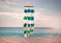 Aqua White Green Capiz Wind Chime (1 chime approx. 18 x 5.5 inches) Circle Square White Aqua Capiz Wind Chime for coastal home decoration! Copyright 2025 SeaShellSupply.com.