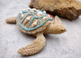 Sandy Sea Turtle Figure With Seashells Net Starfish (1 turtle approx. 5+ inches) Sand Texture Resin Cast Sea Turtle Figure for home decor! Copyright 2025 SeaShellSupply.com.