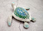 Sea Turtle Blue Green Glass Mosaic Shell Figurine (1 figure approx. 6.25+ inches long) Glass Mosaic Shell Sea Turtle Figure for home decor! Copyright 2025 SeaShellSupply.com.