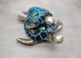 Blue Silver Sea Turtle Pair Resin Figurine (1 turtle approx. 6.5 inches long) Blue Silver Sea Turtle Pair Figure for coastal home décor! Copyright 2025 SeaShellSupply.com.