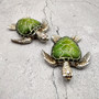 Silver Green Sea Turtle Resin Painted Figurine (1 turtle approx. 3+ inches) Resin Silver Green Sea Turtle Figure for gifting & display! Copyright 2025 SeaShellSupply.com.