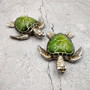 Silver Green Sea Turtle Resin Painted Figurine (1 turtle approx. 3+ inches) Resin Silver Green Sea Turtle Figure for gifting & display! Copyright 2025 SeaShellSupply.com.
