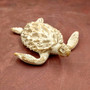 White Sea Turtle Tan Coral Shell Figurine (1 figure approx. 4+ inches) Rough White Tan Sea Turtle Statuette for decor gifts & collecting! Copyright 2025 SeaShellSupply.com.\n