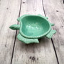 Sea Turtle Pastel Green Plate (1 dish approx. 6.75+ inches wide) Green Sea Turtle Ceramic Dish for coastal table charm display & kitchen accent Copyright 2025 SeaShellSupply.com.