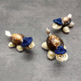 Cowrie Shell Sea Turtle Figurines Dark Blue Hat (3 figures approx. 2+ inches) Cute Cowrie Seashell Sea Turtles for gifts decor & display! Copyright 2025 SeaShellSupply.com