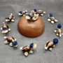 Cowrie Shell Sea Turtle Figurines Dark Blue Hat (3 figures approx. 2+ inches) Cute Cowrie Seashell Sea Turtles for gifts decor & display! Copyright 2025 SeaShellSupply.com