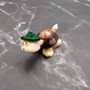 Cowrie Shell Sea Turtle Figurines Green Hat (3 figures approx. 2+ inches) Cute Cowrie Seashell Sea Turtles for gifts decor & display! Copyright 2025 SeaShellSupply.com