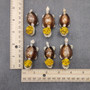 Cowrie Shell Sea Turtle Figurines Yellow Hat (3 figures approx. 2+ inches) Cute Cowrie Seashell Sea Turtles for gifts decor & display! Copyright 2025 SeaShellSupply.com