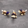 Cowrie Shell Sea Turtle Figurines Purple Hat (3 figures approx. 2+ inches) Cute Cowrie Seashell Sea Turtles for gifts decor & display! Copyright 2025 SeaShellSupply.com.