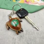 Green Hibiscus Painted Wooden Sea Turtle Keychain (1 keychain approx. 4.25+ inches) Wooden Sea Turtle Key Fob for gifting or party favors!