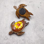 Wooden Sea Turtle Magnet Yellow Hibiscus Flower (1 magnet approx. 2+ inches) Wood Sea Turtle Magnet gift for fridges cabinets doors! Copyright 2025 SeaShellSupply.com.
