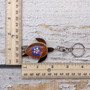 Purple Hibiscus Painted Wooden Sea Turtle Keychain (1 keychain approx. 4.25+ inches) Wooden Sea Turtle Key Fob for gifting or party favors! Copyright 2025 SeaShellSupply.com.