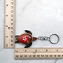Red Hibiscus Painted Wooden Sea Turtle Keychain (1 keychain approx. 4.25+ inches) Wooden Sea Turtle Key Fob for gifting or party favors! Copyright 2025 SeaShellSupply.com.
