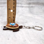 Blue Hibiscus Painted Wooden Sea Turtle Keychain (1 keychain approx. 4.25+ inches) Wooden Sea Turtle Key Fob for gifting or party favors! Copyright 2025 SeaShellSupply.com.