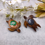 Wooden Sea Turtle Magnet Green Hibiscus Flower (1 magnet approx. 2+ inches) Wood Sea Turtle Magnet gift for fridges cabinets doors! Copyright 2025 SeaShellSupply.com.