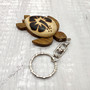 Natural Wood Hibiscus Sea Turtle Keychain (1 keychain approx. 4+ inches) Wooden Pattern Sea Turtle Key Fob for gifting or decorative charm! Copyright 2025 SeaShellSupply.com.