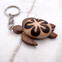 Natural Wood Plumeria Sea Turtle Keychain (1 key chain approx. 4+ inches) Wooden Pattern Sea Turtle Key Fob for gifting or decorative charm! Copyright 2025 SeaShellSupply.com.
