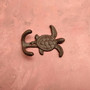 Cast Iron Sea Turtle Wall Hooks Brown Patina (1 metal hook approx. 4.75+ inches) Brown Sea Turtle Double Wall Hook for coastal decor! Copyright 2025 SeaShellSupply.com.