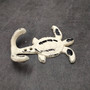 Cast Iron Sea Turtle Wall Hooks White Distressed (1 metal hook approx. 4.75+ inches) White Sea Turtle Double Wall Hook for coastal decor! Copyright 2025 SeaShellSupply.com.