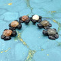 Natural Marble Stone Black Sea Turtle (1 stone figure approx. 2+ inches) Carved Marble Turtle Figurine for coastal home shelf decor! Copyright 2025 SeaShellSupply.com.