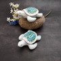 Beach Glass Sea Turtle Blue Green Mosaic Shell Figurine (1 sea turtle approx. 5.5 inches long) Glass Mosaic Shell Sea Turtle for home decor! Copyright 2025 SeaShellSupply.com.