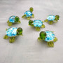 Swirl Glass Sea Turtle Figurine Green Blue (1 figure approx. 1.5 inches) Swirly Green Blue Glass Sea Turtle for gifts décor & collecting! Copyright 2025 SeaShellSupply.com.