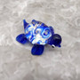 Swirl Glass Sea Turtle Figurine Blue (1 sea turtle figure approx. 1.5 inches) Swirly Blue Glass Sea Turtle for gifts décor & collecting! Copyright 2025 SeaShellSupply.com.