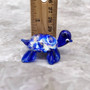 Swirl Glass Sea Turtle Figurine Blue (1 sea turtle figure approx. 1.5 inches) Swirly Blue Glass Sea Turtle for gifts décor & collecting! Copyright 2025 SeaShellSupply.com.