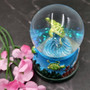 Small Sea Turtle Water Globe with Dolphin and Coral Base (1 globe approx. 2.75 inches tall) Cute Sea Turtle Water Globe for gifts & decor! Copyright 2025 SeaShellSupply.com.