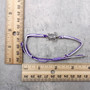 Sea Turtle Charm Bracelet Lavender Purple White Cord (approx. 5-7+ inches AROUND) Purple Sea Turtle String Bracelet Jewelry for gifting! Copyright 2025 SeaShellSupply.com.\n