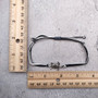 Sea Turtle Charm Bracelet Black Grey White Cord (approx. 5-7+ inches AROUND) Black Grey Sea Turtle String Bracelet Jewelry for gifting! Copyright 2025 SeaShellSupply.com.