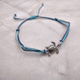 Sea Turtle Charm Bracelet Dark and Light Blue White Cord (approx. 5-7+ inches AROUND) Navy and Baby Blue Sea Turtle String Bracelet to gift! Copyright 2025 SeaShellSupply.com.