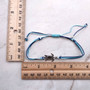 Sea Turtle Charm Bracelet Dark and Light Blue White Cord (approx. 5-7+ inches AROUND) Navy and Baby Blue Sea Turtle String Bracelet to gift! Copyright 2025 SeaShellSupply.com.