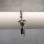 Sea Turtle Charm Bracelet Brown Green White Cord (approx. 5-7+ inches AROUND) Olive Green Brown Sea Turtle String Bracelet Jewelry to gift! Copyright 2025 SeaShellSupply.com.