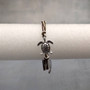Sea Turtle Charm Bracelet Brown Green White Cord (approx. 5-7+ inches AROUND) Olive Green Brown Sea Turtle String Bracelet Jewelry to gift! Copyright 2025 SeaShellSupply.com.