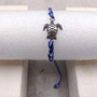 Sea Turtle Bracelet Braided Cord Navy Blue White (approx. 5-7+ inches AROUND) Navy Royal Blue White Knit String Sea Turtle Bracelet to gift! Copyright 2025 SeaShellSupply.com.