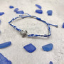 Sea Turtle Bracelet Braided Cord Navy Blue White (approx. 5-7+ inches AROUND) Navy Royal Blue White Knit String Sea Turtle Bracelet to gift! Copyright 2025 SeaShellSupply.com.