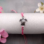 Sea Turtle Bracelet Braided Cord Magenta Pink White (approx. 5-7+ inches AROUND) Rose Blush White Knit String Sea Turtle Bracelet to gift! Copyright 2025 SeaShellSupply.com.