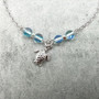 Sea Turtle Anklet Aqua Blue Beads Silver Color (approx. 9+ inches AROUND) Cute Blue Sea Turtle Charm Anklet for any beachy outfit! Copyright 2025 SeaShellSupply.com.