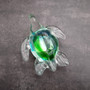 Glass Sea Turtle Figurine Spiral Aqua Green (1 figure approx. 4.5 inches long) Blue Green Glass Sea Turtle for home decor & gifting! Copyright 2025 SeaShellSupply.com.