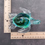 Glass Sea Turtle Figurine Spiral Aqua Green (1 figure approx. 4.5 inches long) Blue Green Glass Sea Turtle for home decor & gifting! Copyright 2025 SeaShellSupply.com.