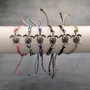 Sea Turtle Charm Bracelet Pink White Cord (approx. 5-7+ inches AROUND) Rose Carnation Sea Turtle String Bracelet Jewelry a thoughtful gift! Copyright 2025 SeaShellSupply.com.