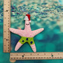 Pink Cartoon Starfish Christmas Ornament (1 Seastar approx. 4+ inches) Hanging Xmas Tree Starfish Ornament for gifting & holiday decor! Copyright 2025 SeaShellSupply.com.